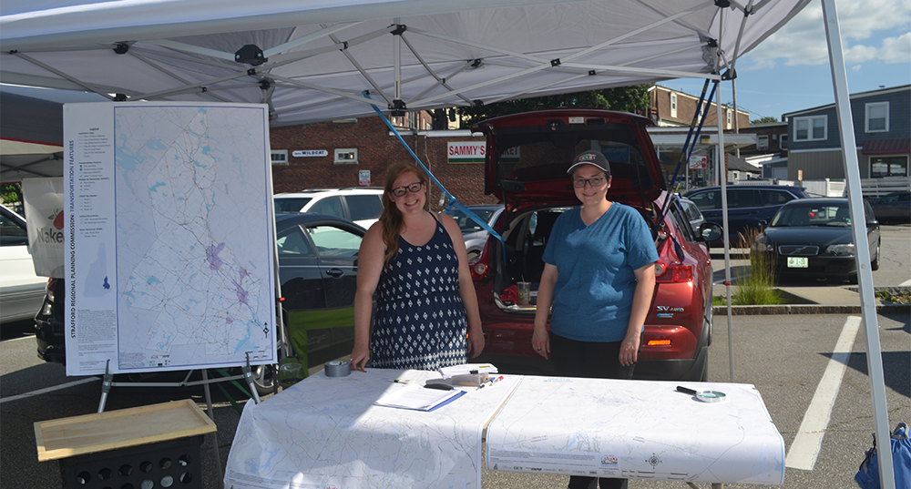 SRPC staff conduct outreach for the Bicycle Level of Traffic Stress project at the Rochester Farmers Market