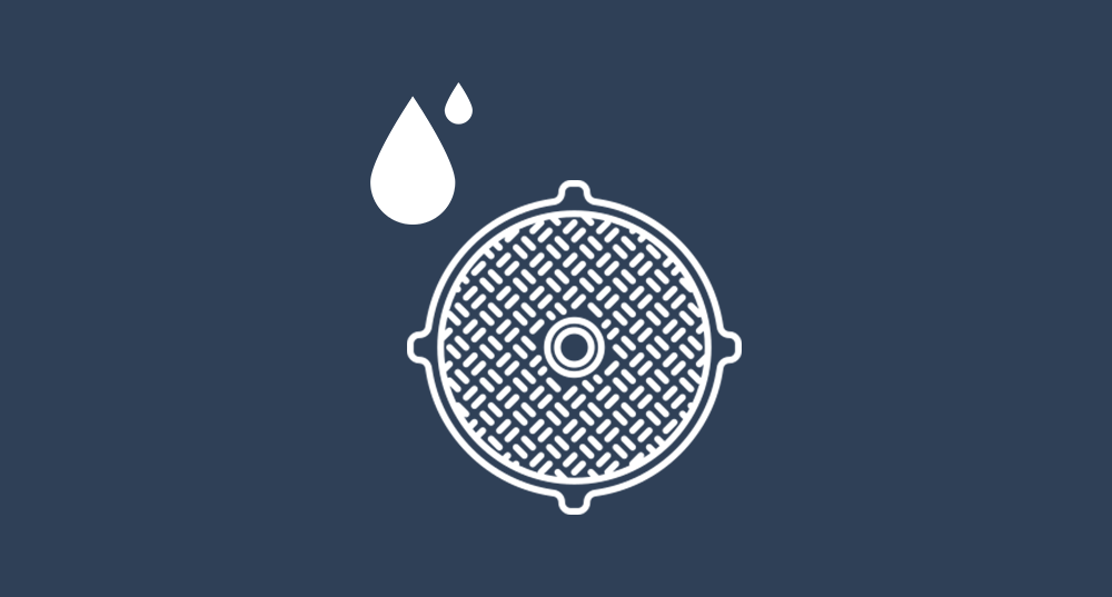 Graphic of a manhole cover and water droplets