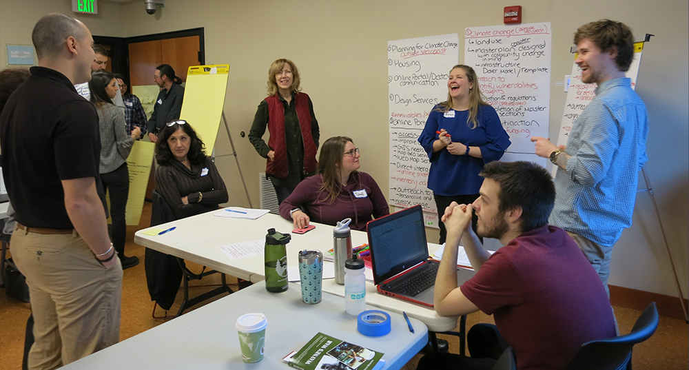 Commissioners, staff and UNH students participate in a facilitated strategic planning session